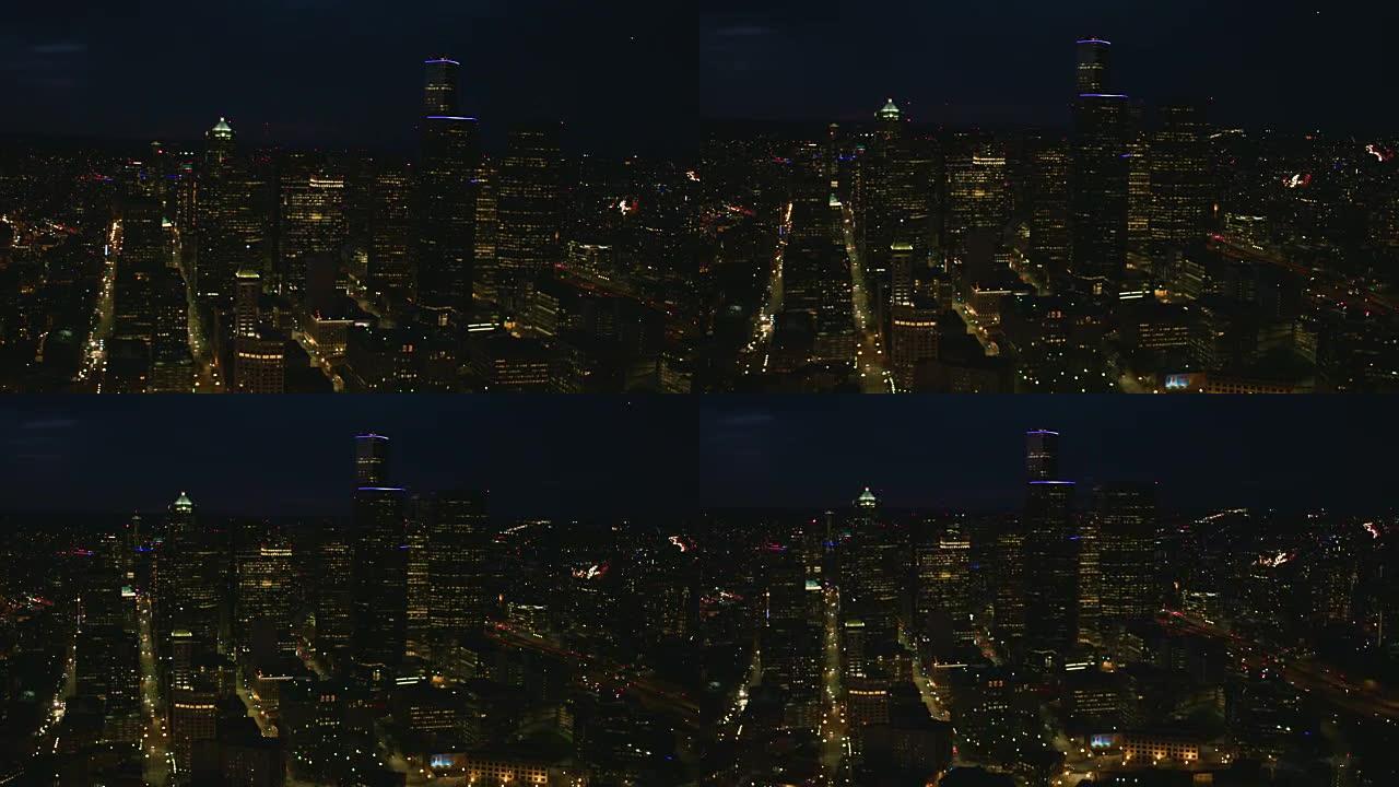 西雅图华盛顿暗夜空中透过办公大楼向北看市区街道城市天际线I5高速公路