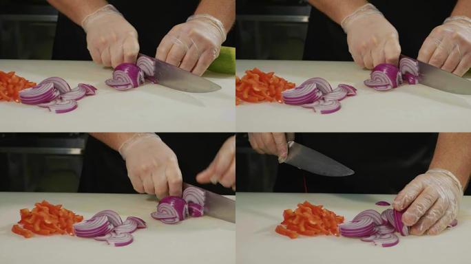 专业厨师切碎蔬菜的慢动作，特写镜头