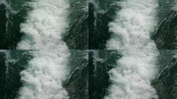 海浪的缓慢运动在海洋上的渡船后面跟踪表面。