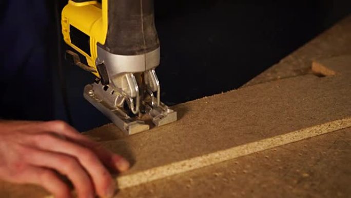 close up shot of a man's hands, who works in a car