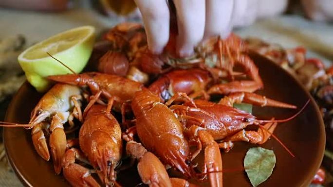 take hand cooked crawfish from the plate