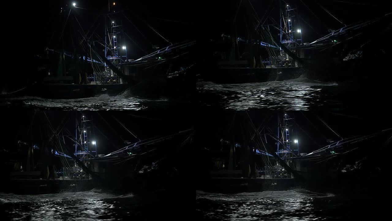 晚上用网捕捞虾拖网渔船
