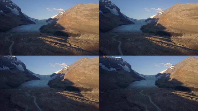 落基山脉冰川的空中拍摄，而日出光