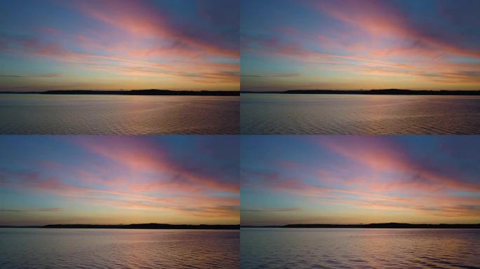 塔科马破折号多色照明充满活力的饱和天空日落空中紫色水反射
