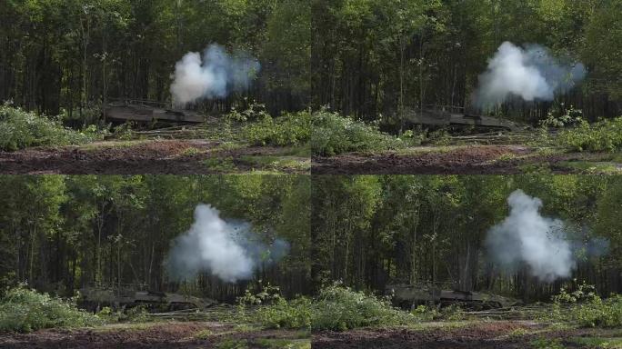 陆军坦克摧毁绿色森林，在射击场的森林中修建道路