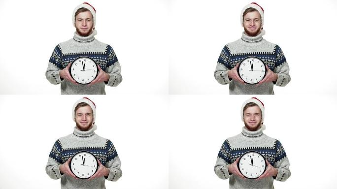 Slow motion handsome man in sweater holding clock 