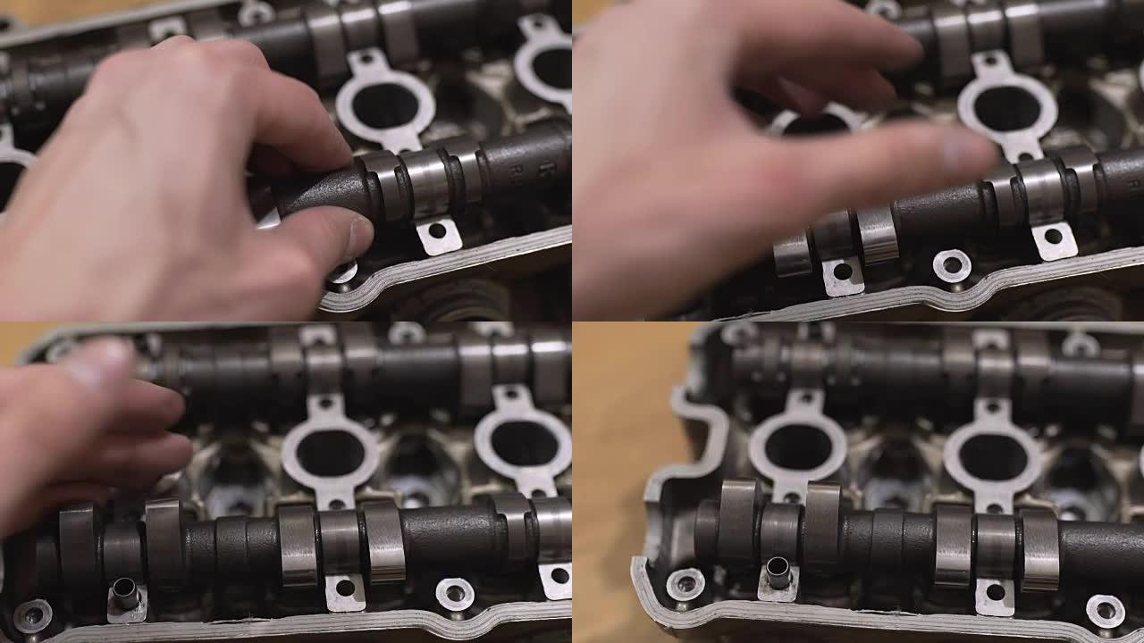 机械师修理损坏的发动机头，更换凸轮轴。特写镜头