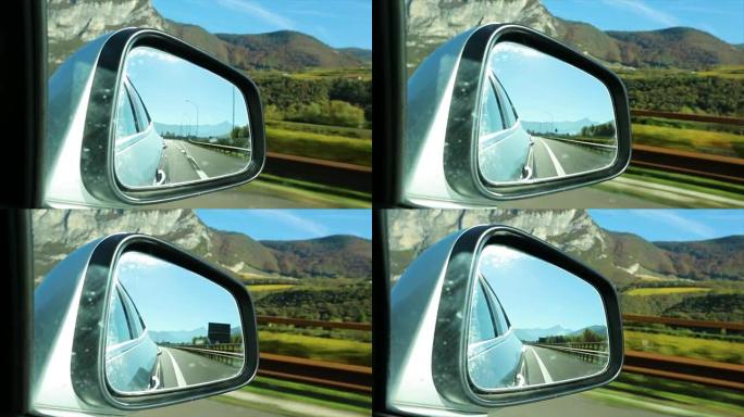 开车透过现代汽车的窗户后视镜