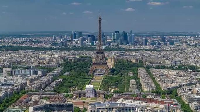 从蒙帕纳斯塔鸟瞰图与埃菲尔铁塔和拉德芳斯区在背景时间推移在巴黎，法国