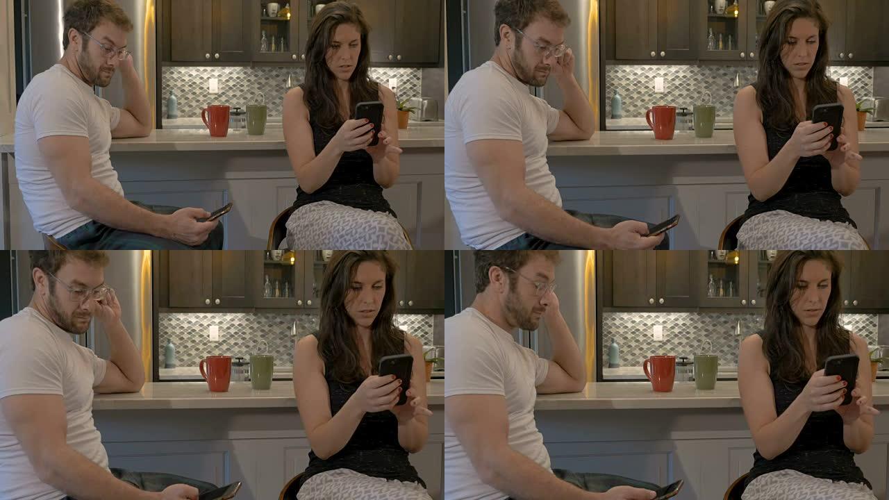 男人和女人在使用智能手机时互相忽略