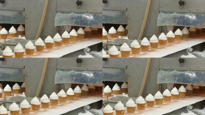 Filling of wafer cups with ice cream.