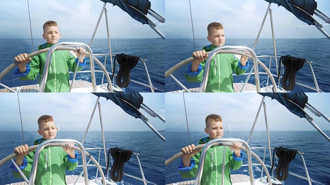 小男孩在加勒比海驾驶帆船