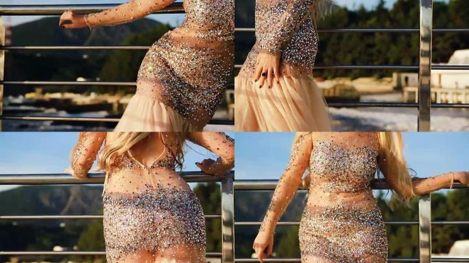 女人模特在大海的背景下摆姿势