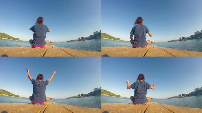 4k海滩瑜伽，白人女孩在码头上拍摄