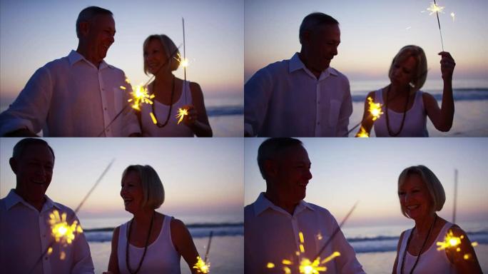 Senior Caucasian couple enjoying beach sunset with