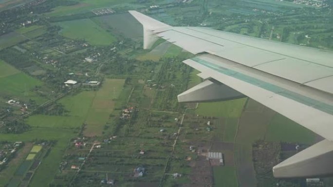 从飞机到飞机机翼的视图和Bagkok上的积云素材视频