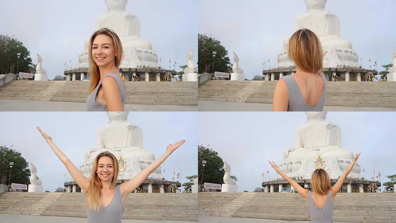 慢动作博客女拍摄在视频附近的佛像在泰国