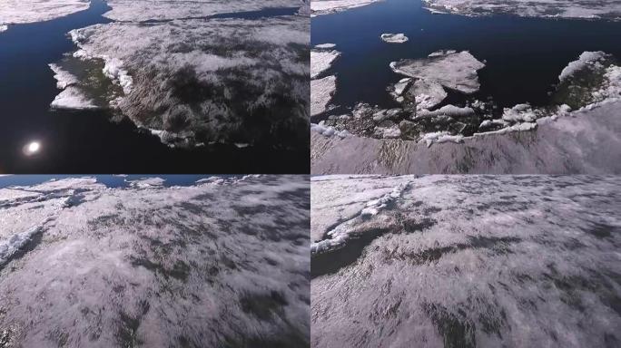 伏尔加河被部分冻结，大块冰块形成蓝白相间的拼布。