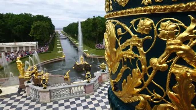 跟踪镜头显示俄罗斯圣彼得堡彼得霍夫的宏伟宫殿喷泉和雕塑公园