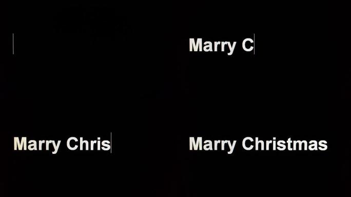 在特写镜头中在计算机屏幕上键入 “Marry christmas”