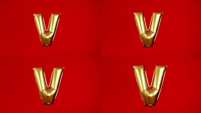 红色背景上的爱这个词的金色大充气字母V。