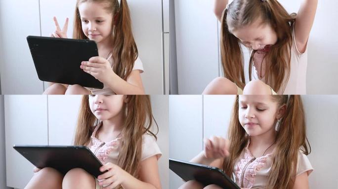 情感女孩正在使用平板电脑玩电子游戏。带电子小工具的儿童肖像