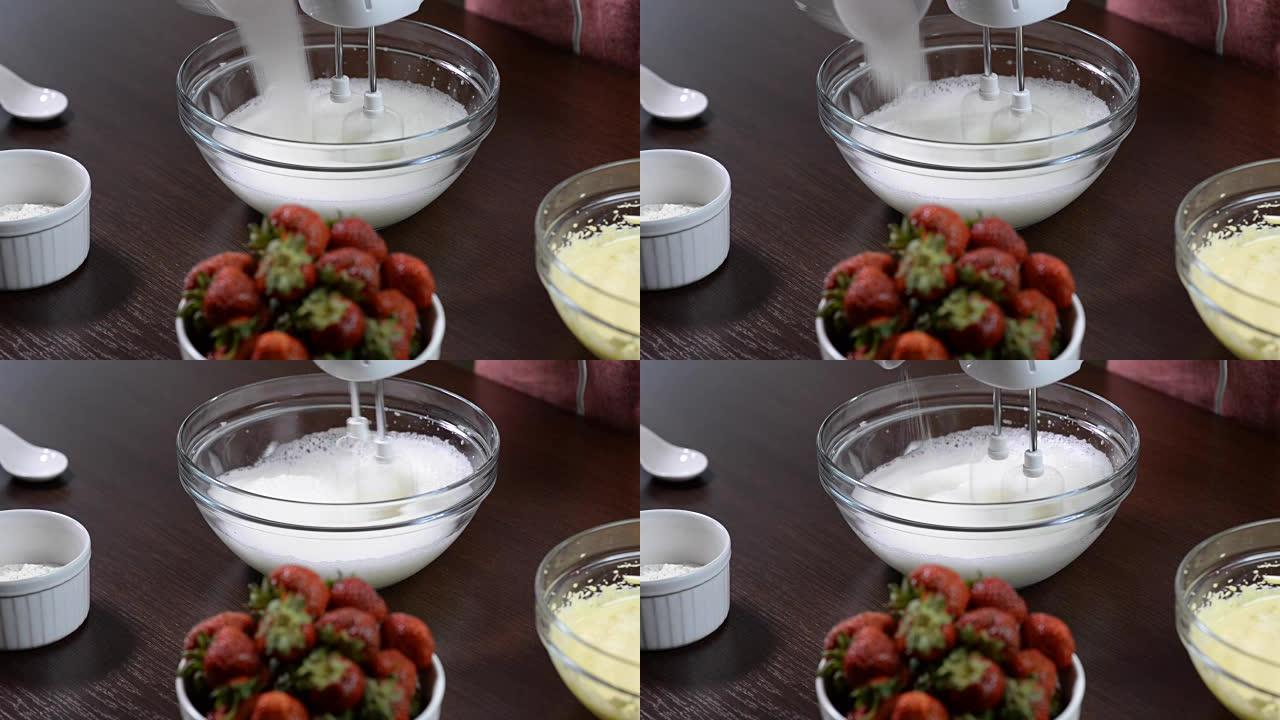 混合甜奶油时加糖。用电机搅拌器在碗中混合白鸡蛋奶油。