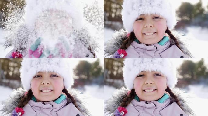 女孩很高兴扔雪。特写