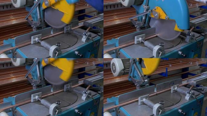 在工业数控机床上切割金属铜管。