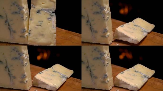 蓝色奶酪落在木板上的慢动作