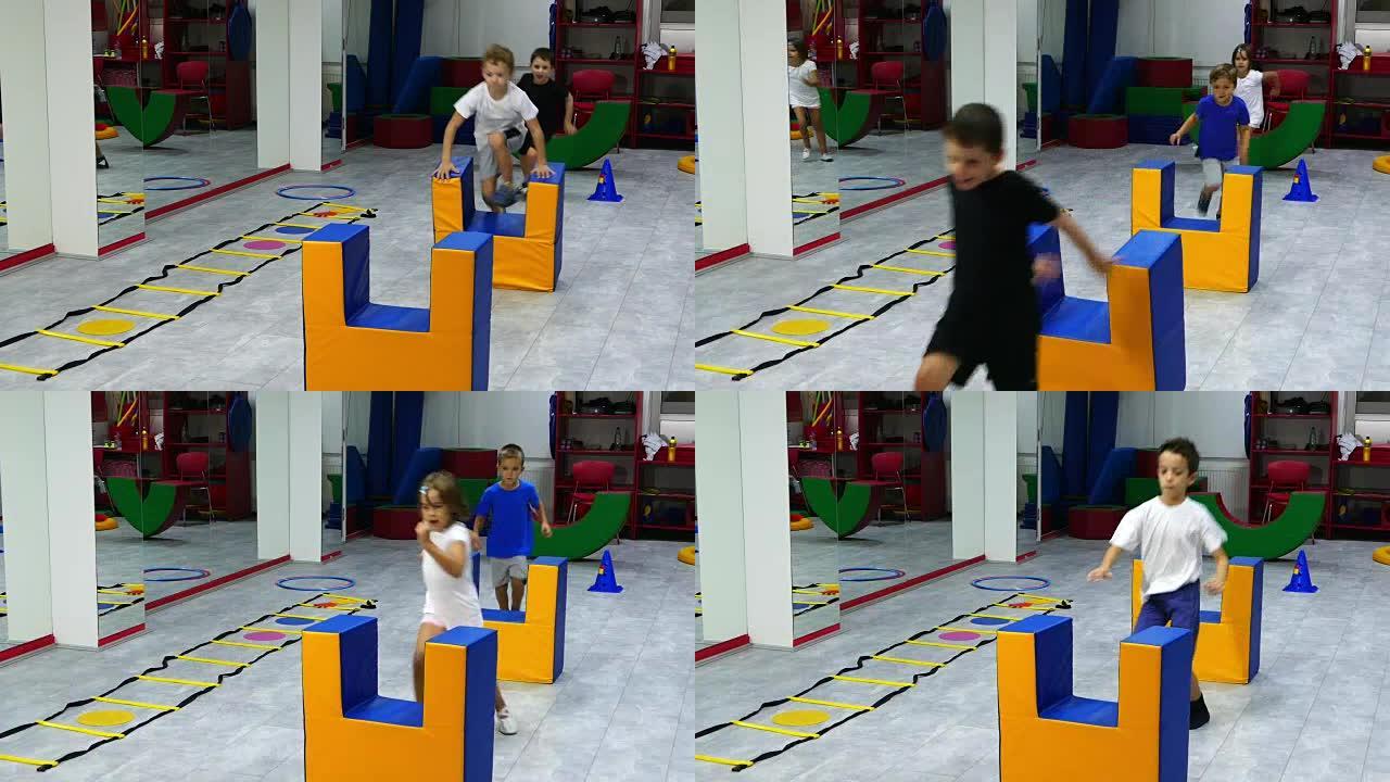 孩子们在训练场上跳过障碍物。