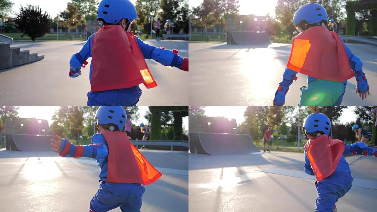 体育活动，穿着超级英雄服装的无所畏惧的孩子在滑板公园骑着滚轮并挥舞双手