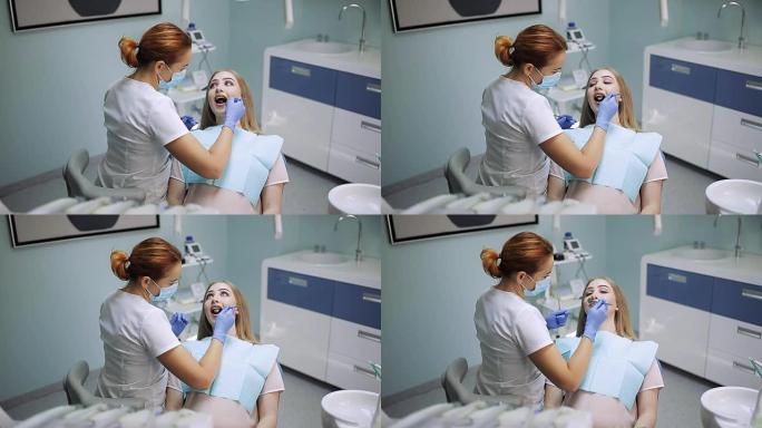 戴面具的女性口腔科医生。女医生在工作。照镜子的病人。