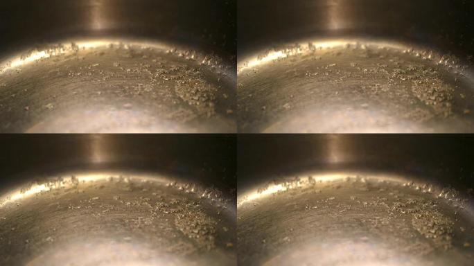热影响铬罐底部的小菜籽油颗粒