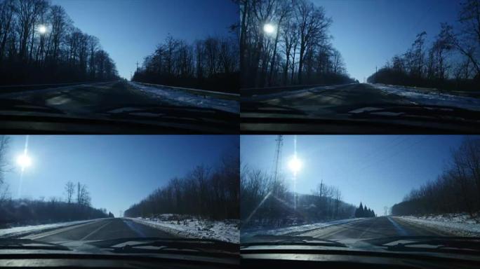 在结冰的道路上驾驶汽车。危险的道路。冬季风景
