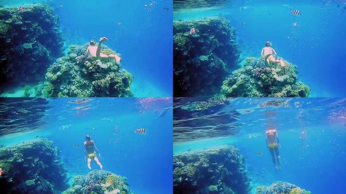 女人穿着浮潜潜水面具在水下潜水