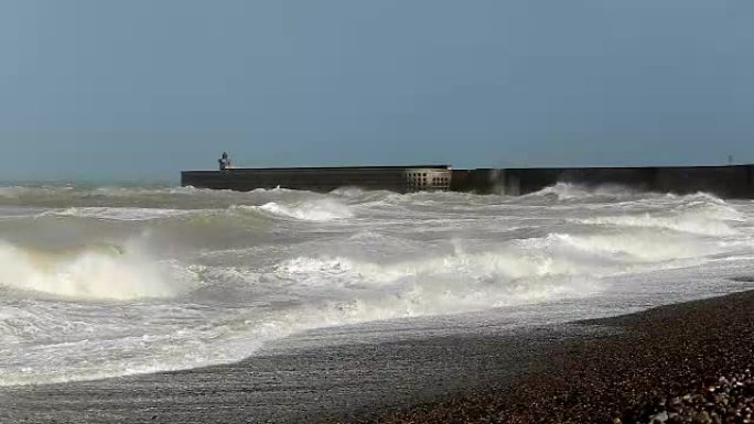 Crashing waves coming up on the shore of the Engli