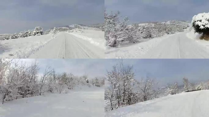 冬季雪地公路上快速跑车驾驶的延时，上山