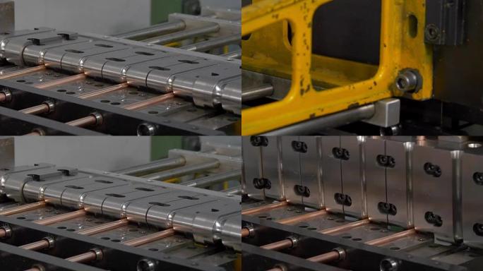 在工业数控机床上弯曲和切割金属铜管。