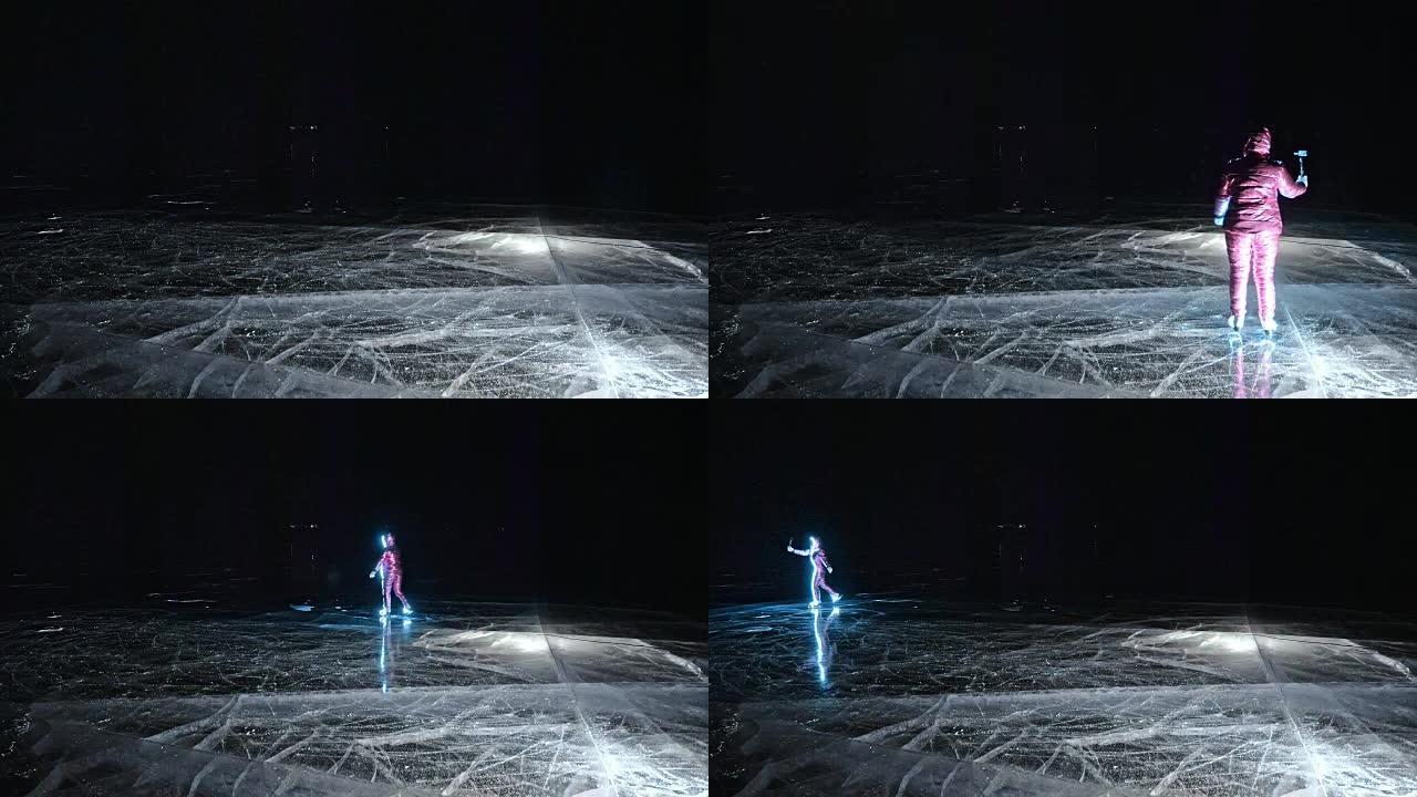 女人在滑冰之夜。女孩在大自然中骑花样冰鞋。女人一起骑在裂缝中的冰上。冰上的神奇天使。穿着溜冰鞋的人在