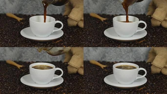 用咖啡豆包围的白色杯子从咖啡壶中倒咖啡4k