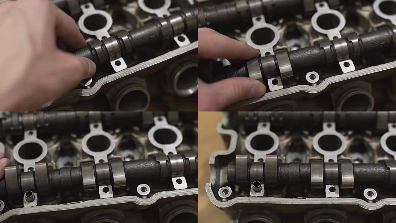 机械师修理损坏的发动机头，更换凸轮轴。特写镜头