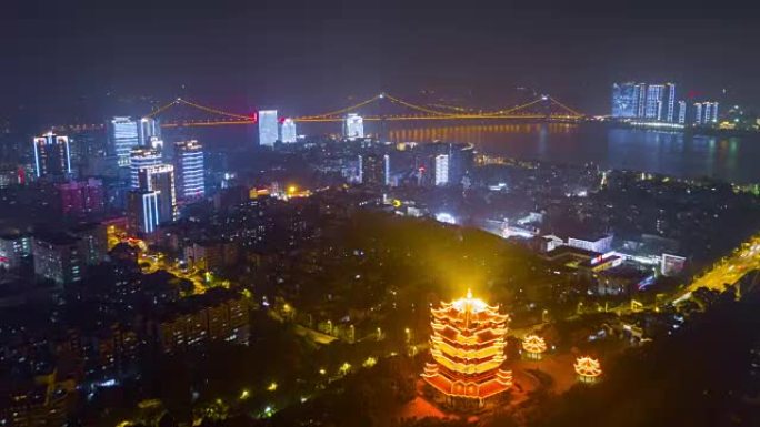 中国夜间照明武汉市著名黄鹤寺空中河边全景4k延时