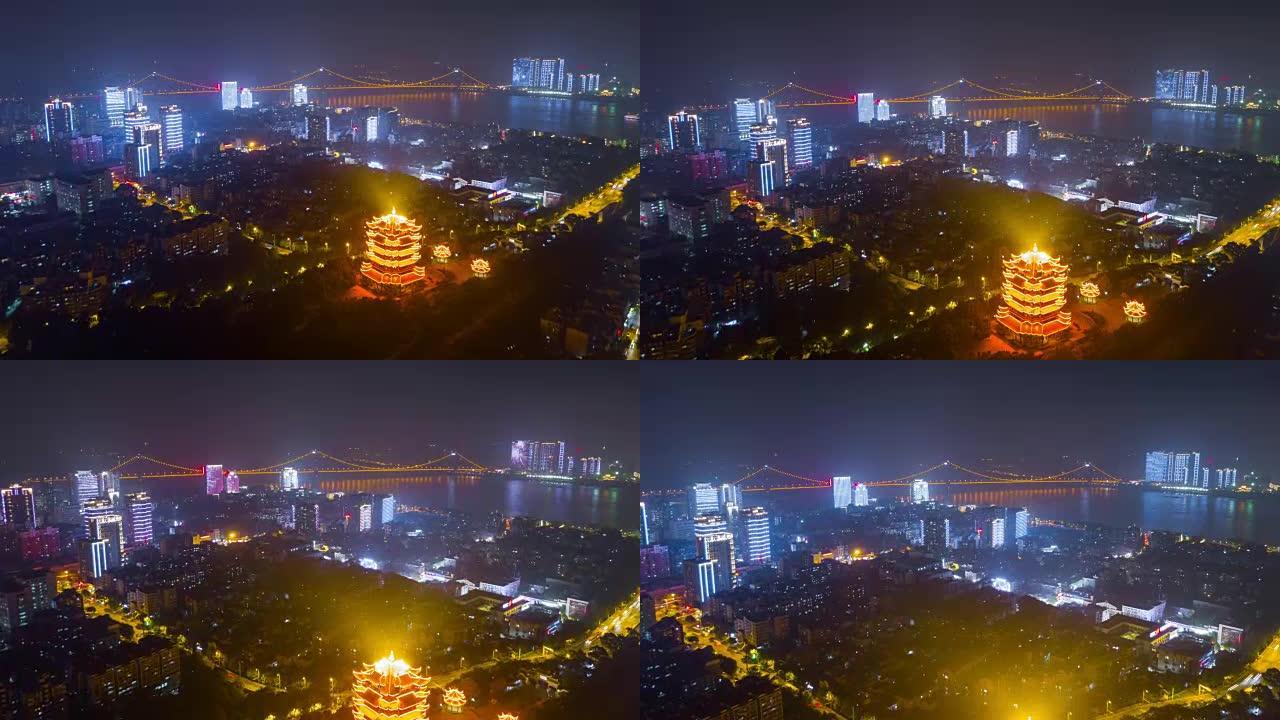 中国夜间照明武汉市著名黄鹤寺空中河边全景4k延时