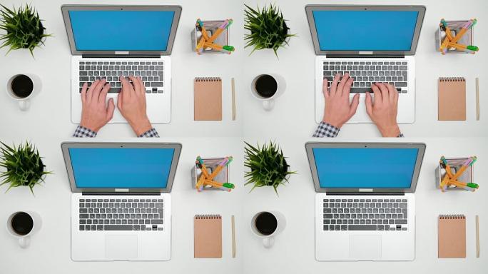 A Man's Hands Typing on the Laptop