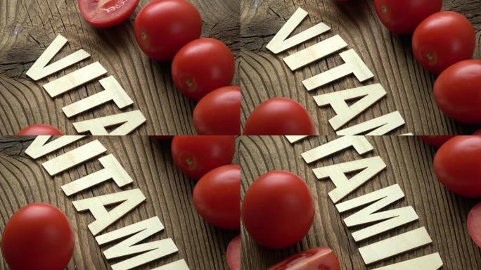 棕色木质表面背景上刻有维生素的番茄。铭文维生素和蔬菜。