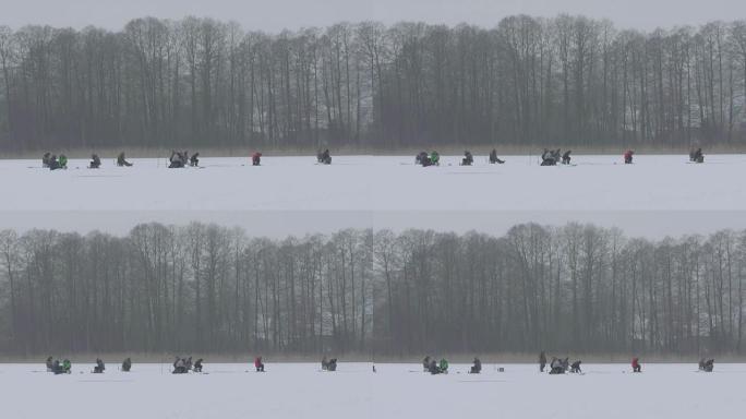 许多渔民正在捕鱼。冰上钓鱼