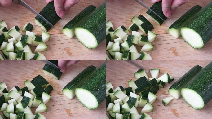 Cut zucchini on chopping board for cooking