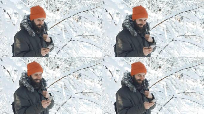 Man in a winter snowy day talking on mobile phone