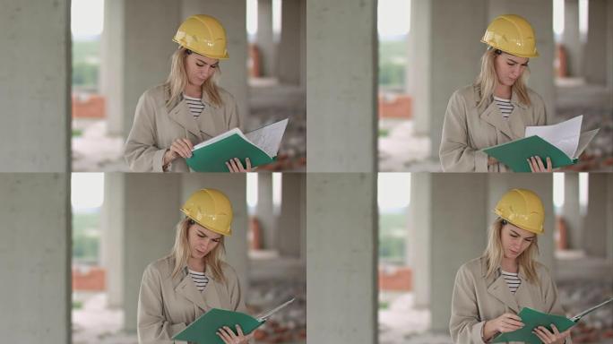 年轻的女建筑师建筑工程师在建筑工地eximining文件